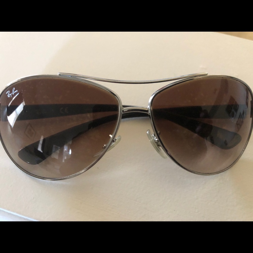 Authentic Ray-Ban Aviator with some scratches.